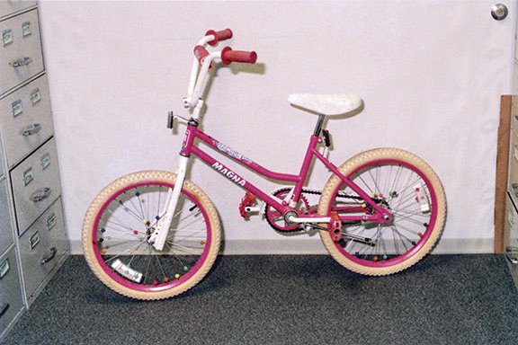 Amber’s pink bicycle recovered in the parking lot where she was abducted.